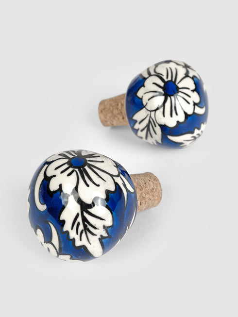 White flower and leaf design with Blue color base wine bottle stoppers (Set of Two).