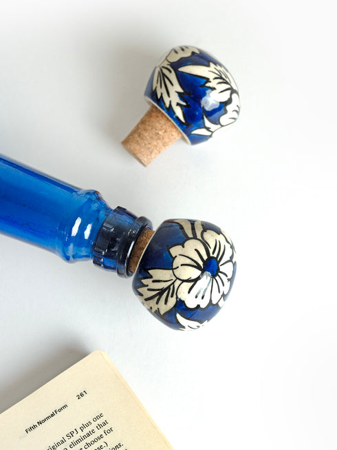 White flower and leaf design with Blue color base wine bottle stoppers (Set of Two).