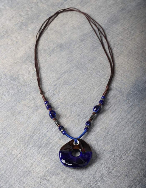 Round Blue and Brown Tassel Pendant with Brown Thread