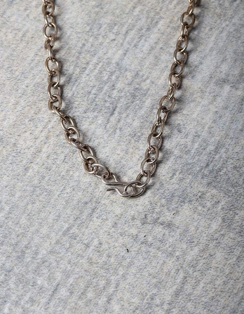 White Metal And Black Beaded Buddha Necklace