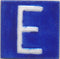 White E alphabet blue tile (2x2)