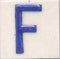 Blue F alphabet white tile (2x2)