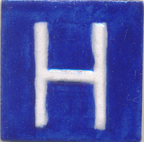 White H alphabet blue tile (2x2)