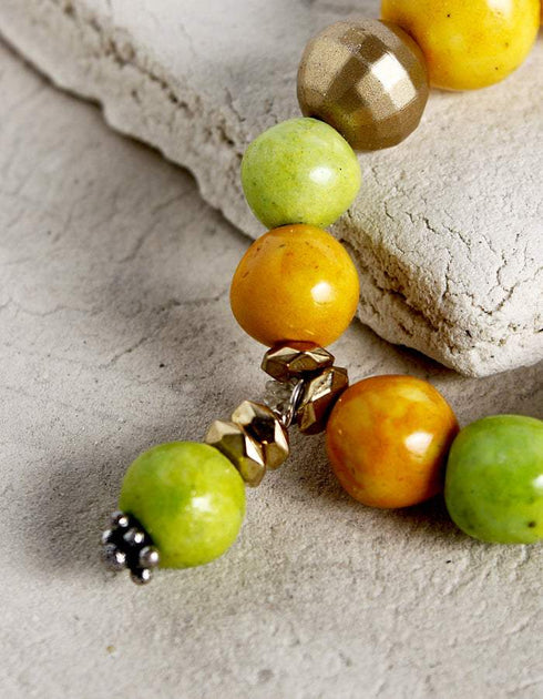 Handmade Stretchable Bracelet With Blue Pottery Beads & Metal Beads - Colour - Yellow & Lime Green