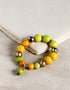 Handmade Stretchable Bracelet With Blue Pottery Beads & Metal Beads - Colour - Yellow & Lime Green