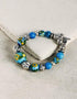 Handmade Stretchable Bracelet With Blue Pottery Beads & Metal Beads - Colour - Turquoise & Yellow