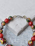 Handmade Round Bracelet With Blue Pottery Beads, Metal Beads & Hook in Red Colour Base With Yellow Flower