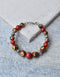 Handmade Round Bracelet With Blue Pottery Beads, Metal Beads & Hook in Red Colour Base With Yellow Flower