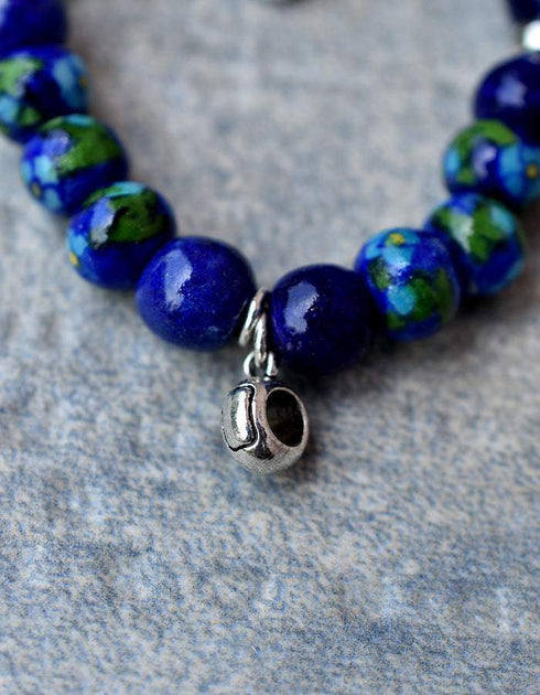 Handmade Stretchable Bracelet With Blue Pottery Beads & Metal Beads in Blue Base With Turquoise Flower.