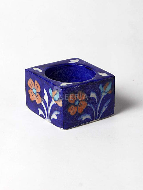 Brown Flower With White Leaves on Blue Base