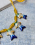 7 Fish Pendant Necklace in Yellow