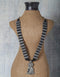 White Metal And Black Beaded Buddha Necklace