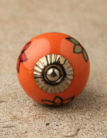 Red, Green and Turquoise Flowers on Orange Ceramic Knob