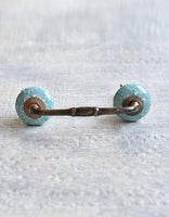 White Design With Turquoise Base Ceramic Pull